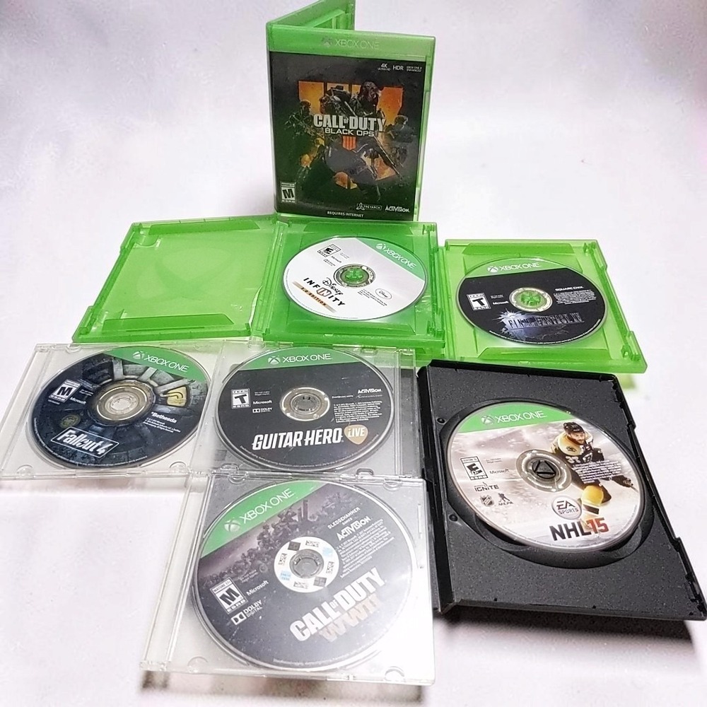Microsoft Xbox One Video Game Lot Bundle 7 Discs COD Black Ops IV WWII Fallout 4